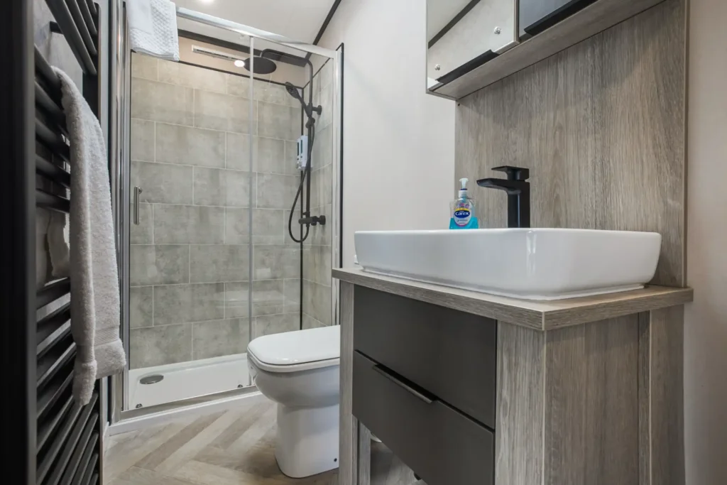 Shower room in Single Lodge 7