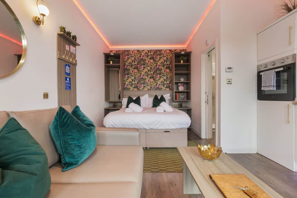 Pod 6 interior with bed and sofa