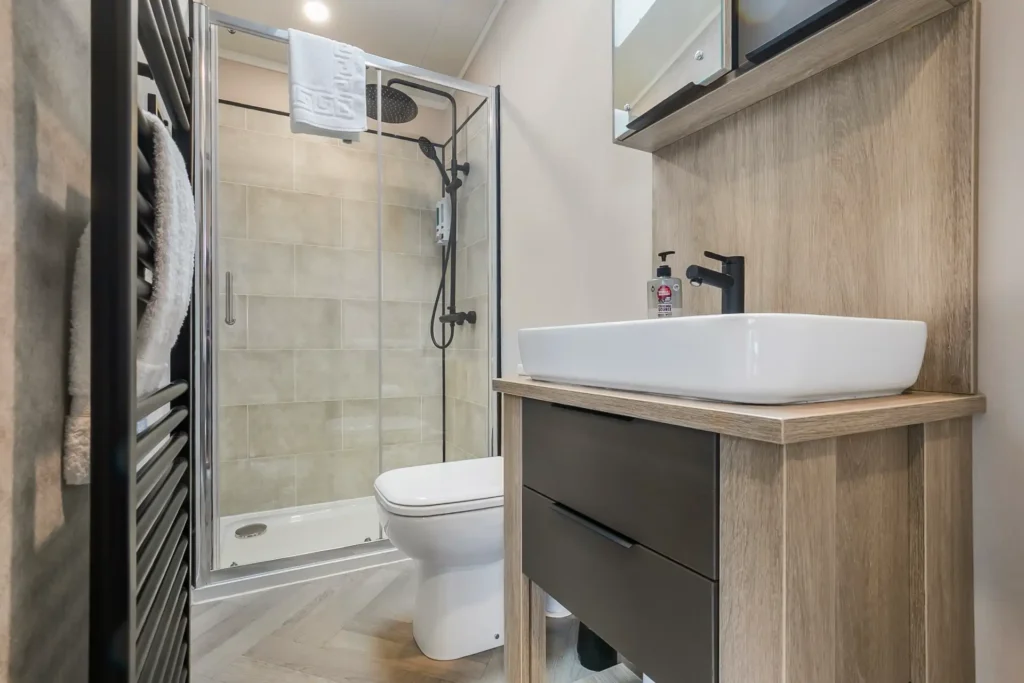 Shower room in Single Lodge 8