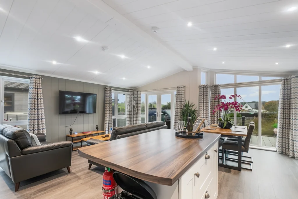 Open-plan living and dining area in Twin Lodge 1
